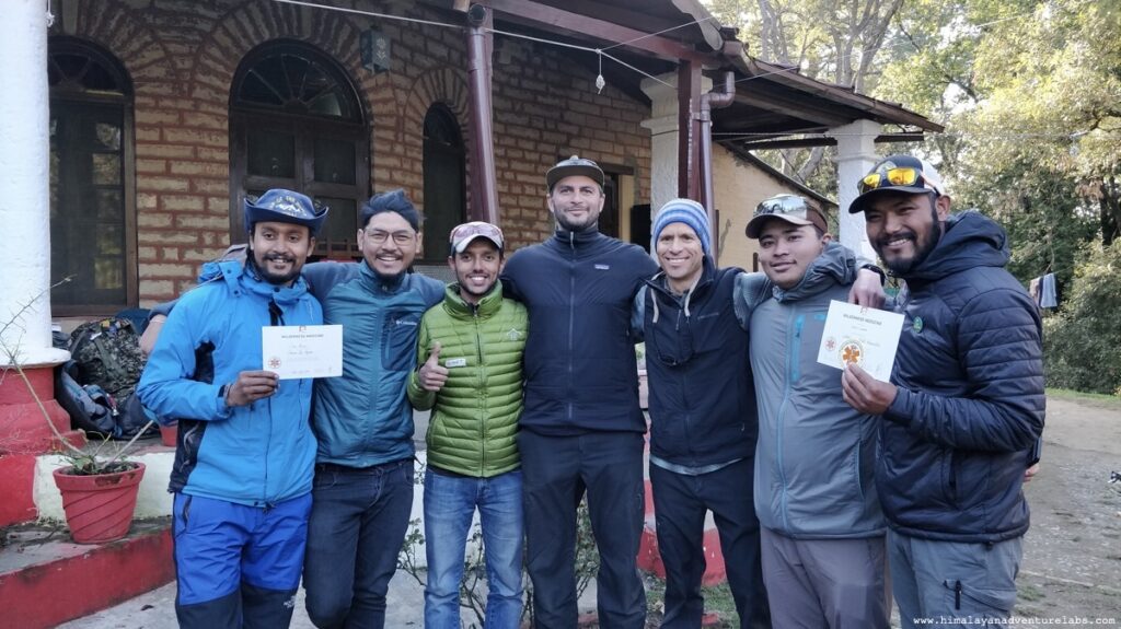 Sudeep posing with fellow Nepali guides, Pablo (NOLS instructor) and Prasad (NOLS instructor) after the completion of NOLS WFR course